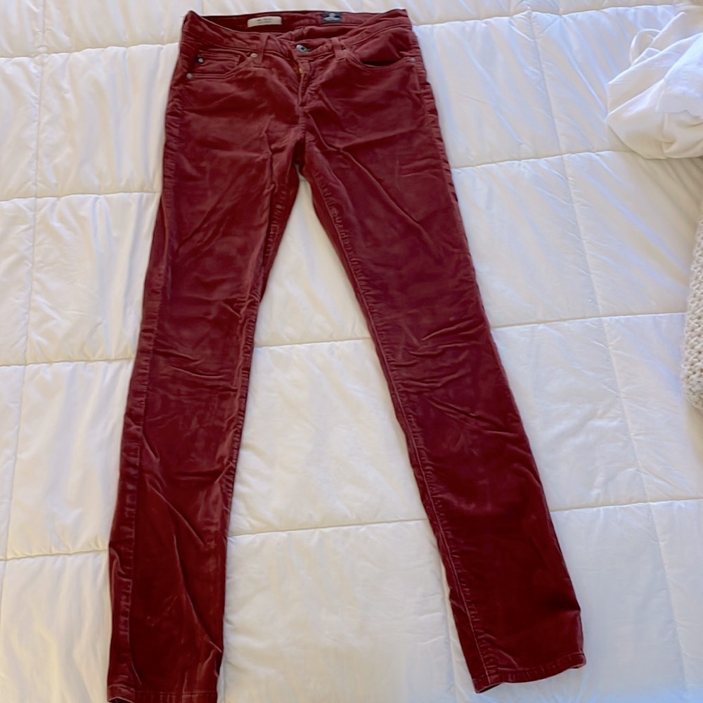AG jeans. The Stevie. Slim straight fit. A burgundy wine color. Size 27R